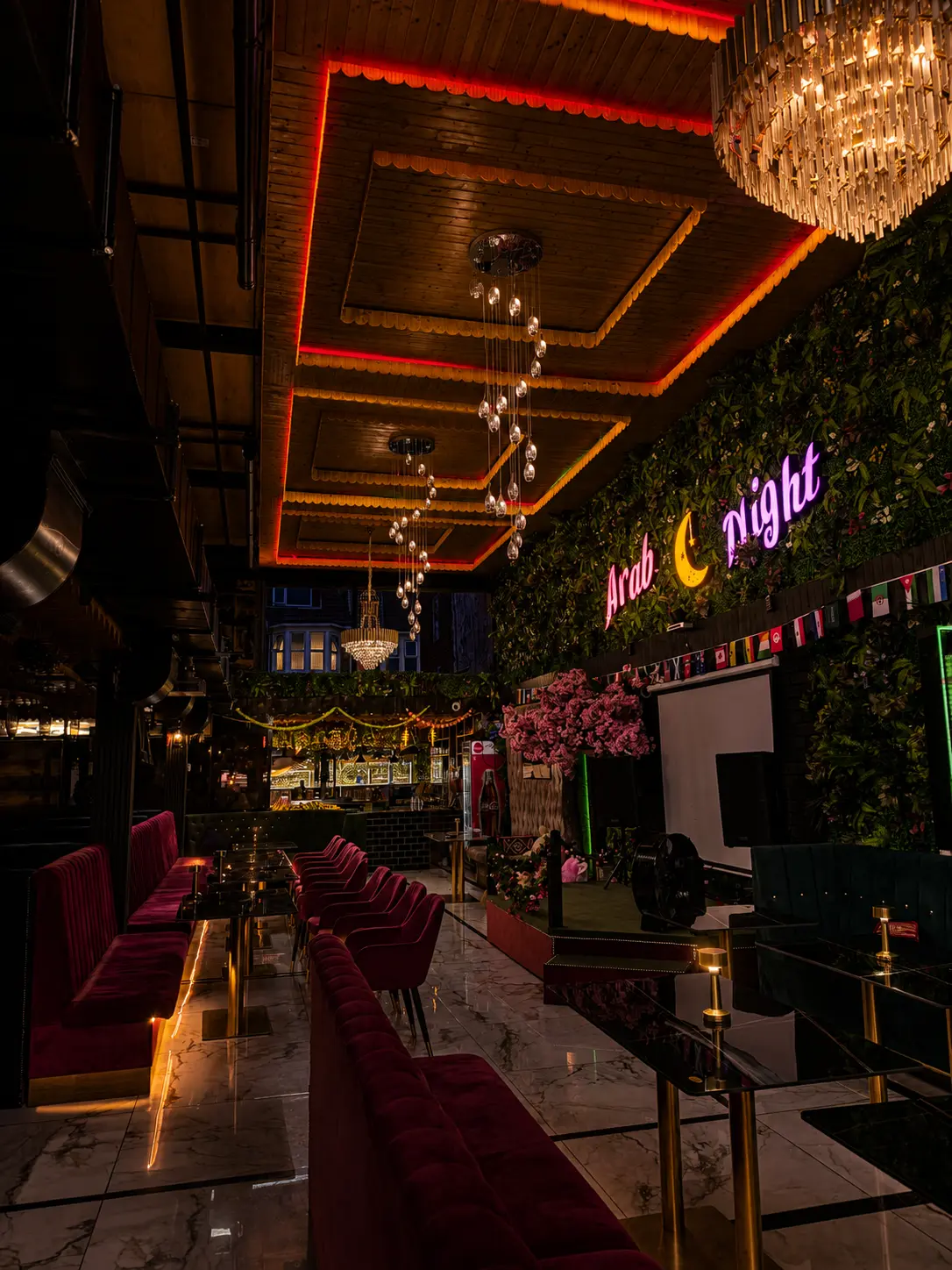 Arab Night neon sign above the lounge floor